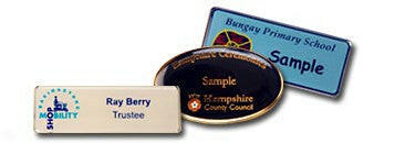 A collection of Crested Name Badges, both etched and printed.