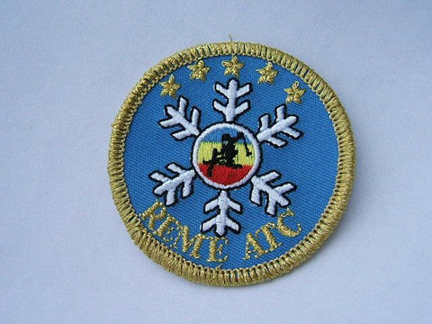 Embroidered badge with a Merrow border.